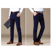 Two views of a person wearing navy pants with brown shoes on a beige background