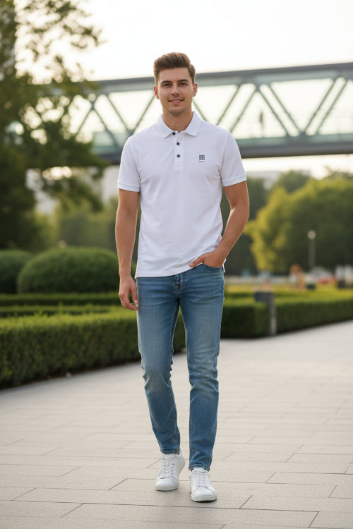 White polo shirt with a logo on a gray background