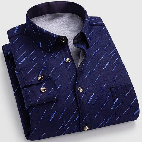 A folded men's button-up shirt in dark navy blue with a fine diagonal stripe pattern, featuring a visible gray fleece lining.