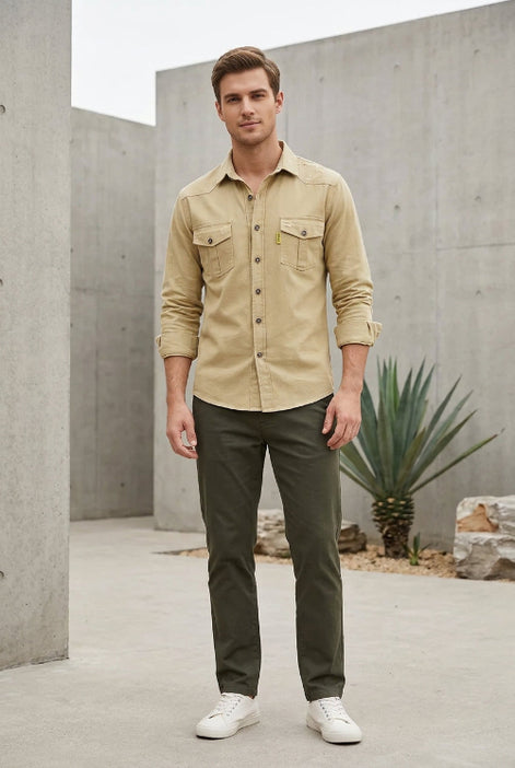 Beige button-up shirt with two front pockets on a white background