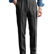 Charcoal gray herringbone pleated suit trousers shown on a white background