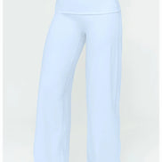 Light blue pants worn by a person on a white background