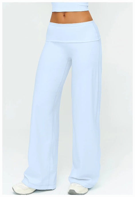 Light blue pants worn by a person on a white background