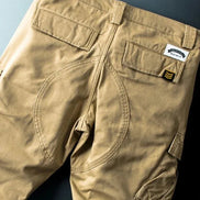 Khaki cargo pants shown flat from the back.