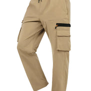 Khaki cargo pants with cargo pockets and a drawstring waist shown at an angle on a white background