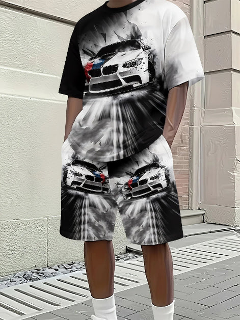 A person wearing a matching black and white graphic t-shirt and shorts set featuring a dramatic racing car print