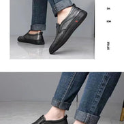 Black loafers worn with jeans on a gray background