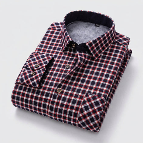 A folded long-sleeve plaid shirt with a gray fleece lining, featuring a navy, red, and white check pattern. 