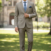 Gray suit with brown shoes on a mannequin against a light blue background