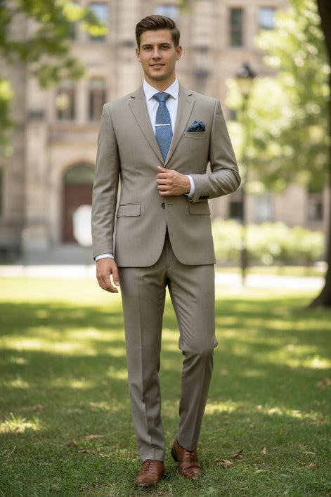 Gray suit with brown shoes on a mannequin against a light blue background