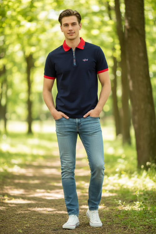 Navy blue polo shirt with red collar and trim on a white background, featuring Tace&Shark logo.