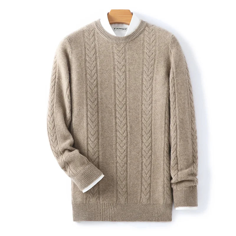 Beige cable knit sweater on a wooden hanger against a white background
