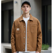 Brown jacket with a brand label on a white background