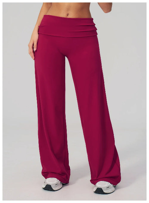 Maroon wide-leg pants worn by a person on a white background
