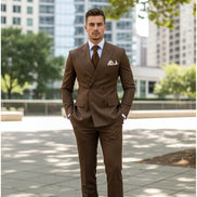 Brown suit with a tie and pocket square on a dark background