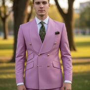 Pink suit with matching jacket and pants on a mannequin against a white background