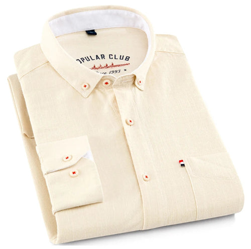 Beige shirt with white collar and 'Opular Club' branding on a white background