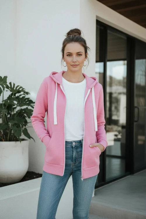 Pink hoodie with a zipper on a white background