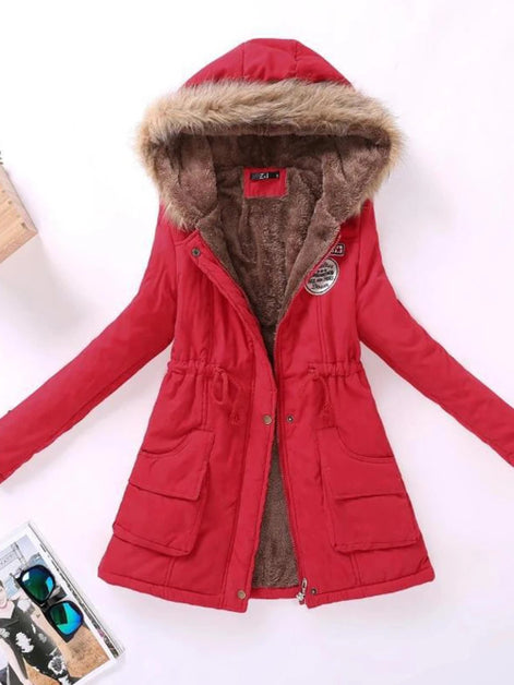 Red parka coat with fur-lined hood on a white background
