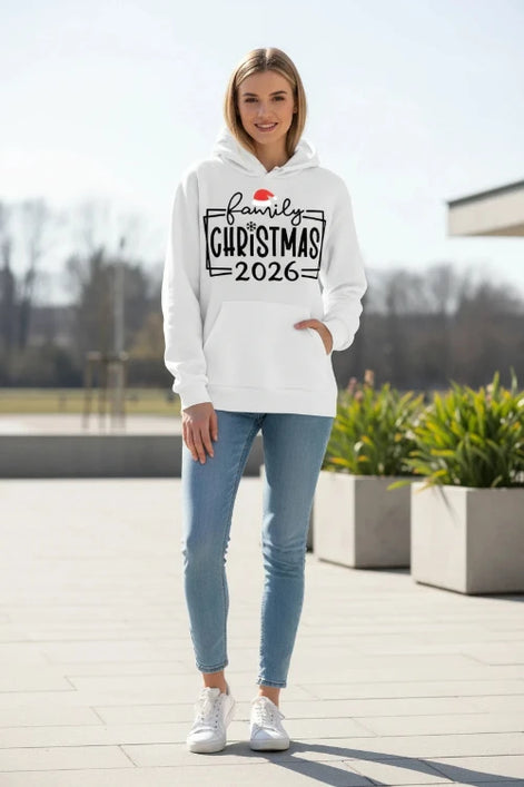 A white pullover hoodie laid flat with a front kangaroo pocket and a large holiday graphic reading 'family CHRISTMAS 2026' 