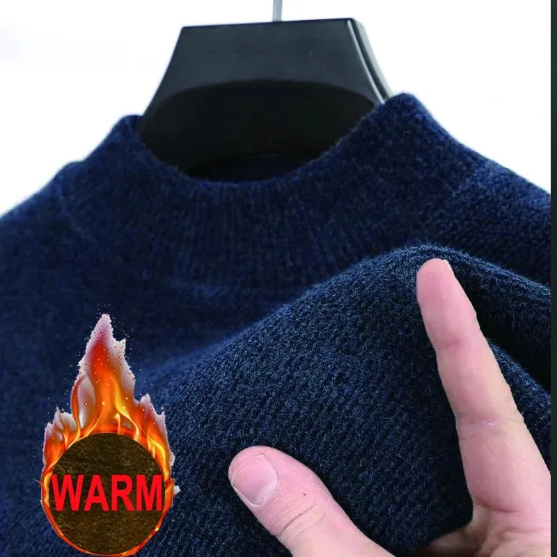Blue sweater on a hanger with a hand pointing to it, featuring a 'warm' icon.