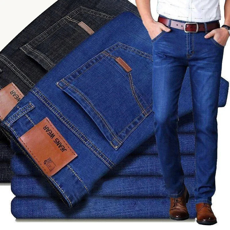 Stack of blue jeans with a person wearing them, showcasing the product.