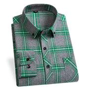Green and gray plaid shirt on a white background