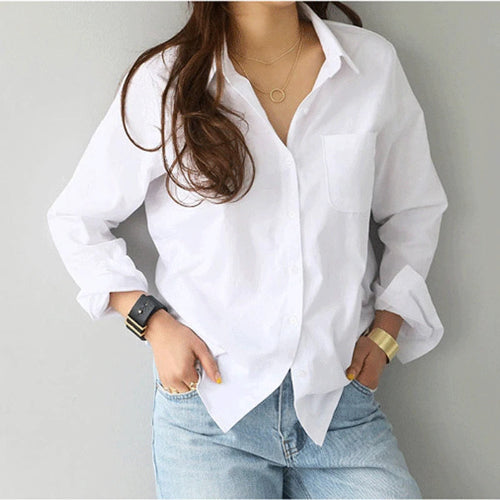White long-sleeve button-down shirt worn by a model, shown from the front