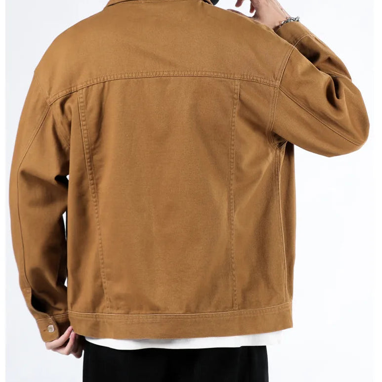 Brown jacket worn by a person on a white background