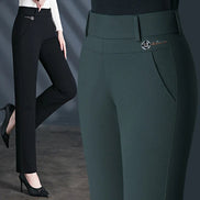 Dark green pants with a brand logo on a gray background