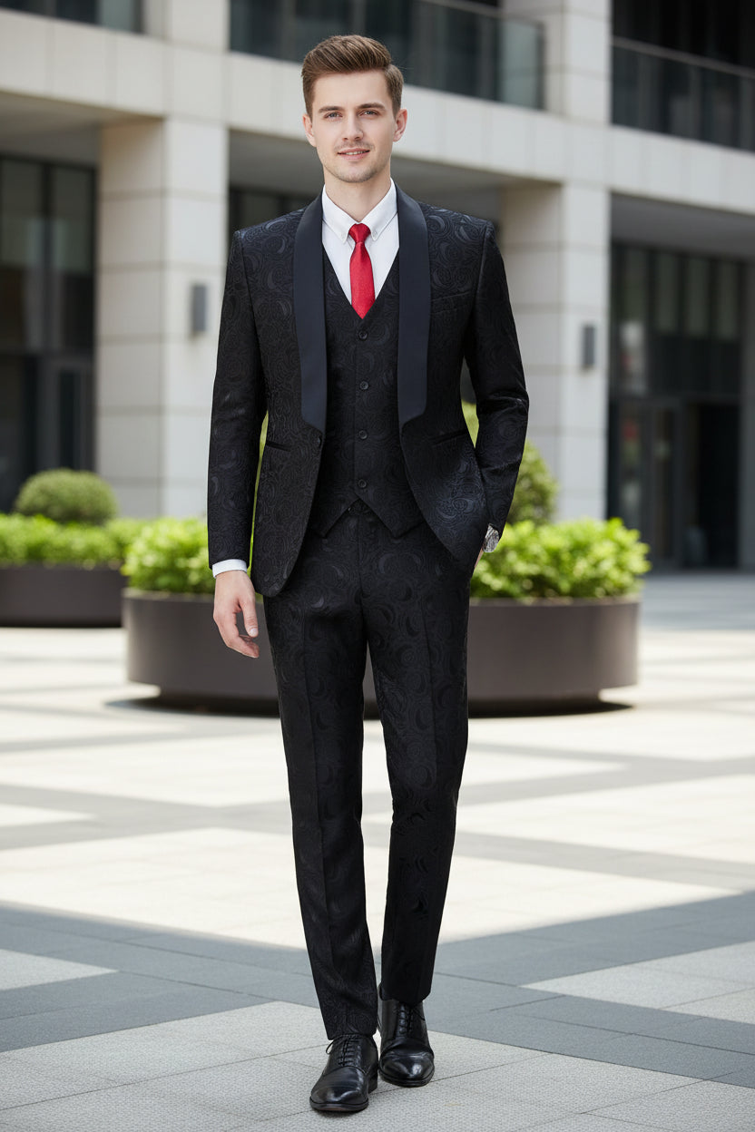 Black patterned suit with a red tie on a white background