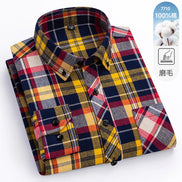 Folded plaid shirt with colorful pattern on a white background