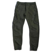 Olive green cargo pants laid flat against a white background, showing angled thigh pockets, buttoned flap pockets, side straps, and gathered ankle cuffs.