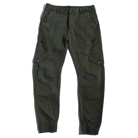 Olive green cargo pants laid flat against a white background, showing angled thigh pockets, buttoned flap pockets, side straps, and gathered ankle cuffs.