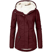 Front view of a burgundy hooded zip-up jacket with white fleece-look lining, drawstrings and buttoned front pockets against a white background⠋
