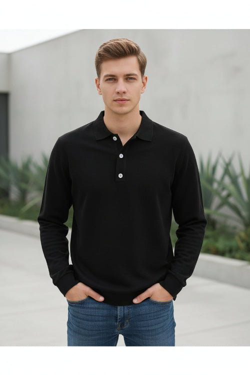 Person wearing a black long-sleeve shirt with a festive background featuring a Christmas tree and red truck.
