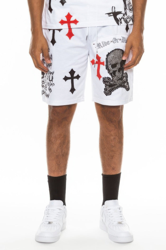 White shorts with black and red designs on a white background