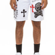 White shorts with black and red designs on a white background