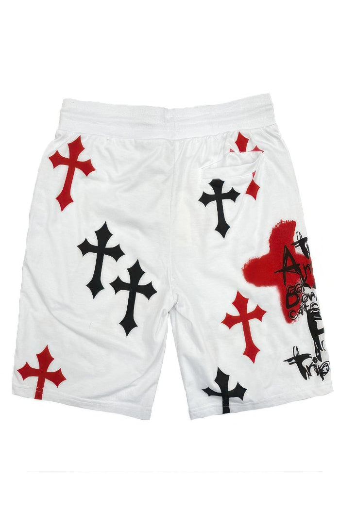 White shorts with black and red cross designs on a white background