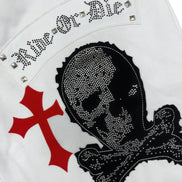 White leather jacket with black skull and crossbones design and 'Live or Die' text.