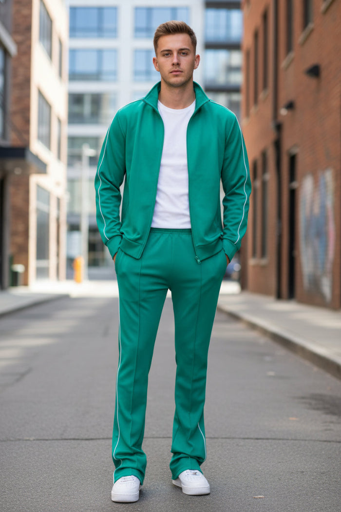 Green medical scrubs with white sneakers  taken outside