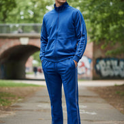 Blue tracksuit with white piping outside