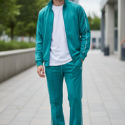 Teal tracksuit with white piping on a  outside