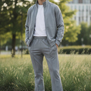 Gray tracksuit with white piping on a  outside