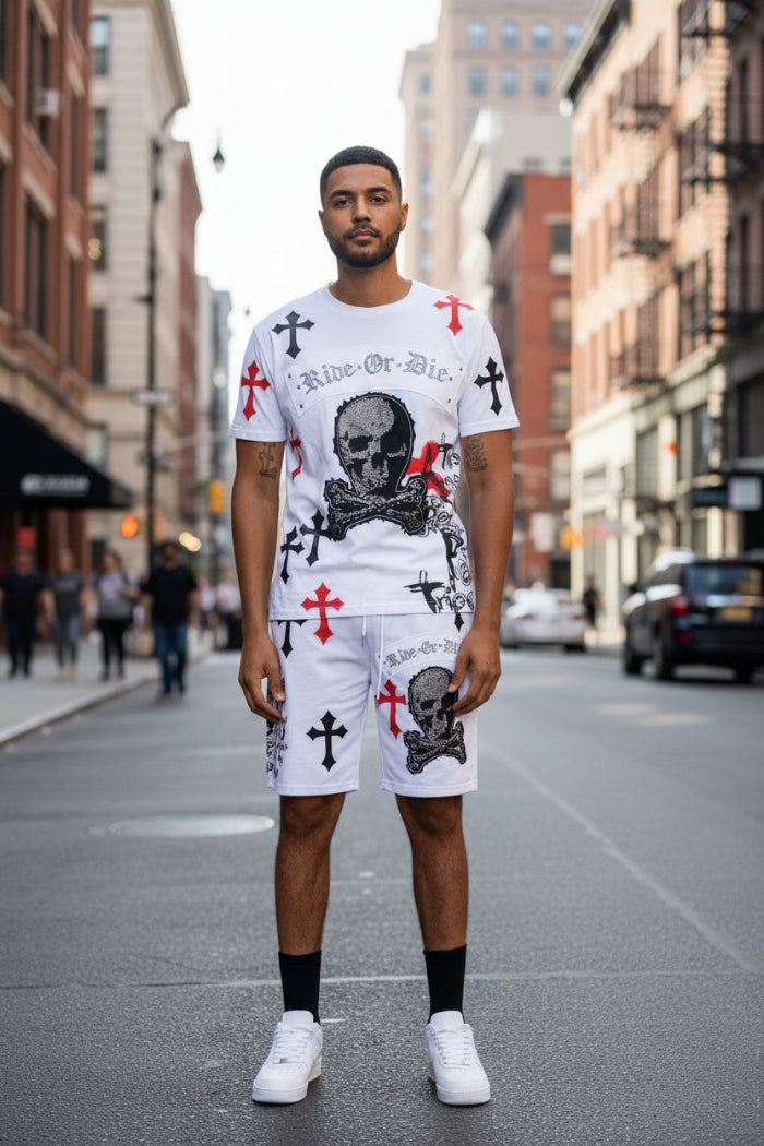 Person wearing a white t-shirt and shorts with skull and crossbones design outside