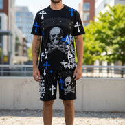Man wearing a black outfit with skull and crossbones design  outside