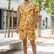 Person wearing a tie-dye outfit  outside