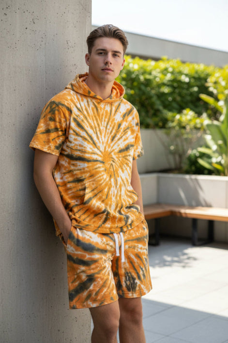 Tie-dye t-shirt and shorts set with orange and black pattern  outside