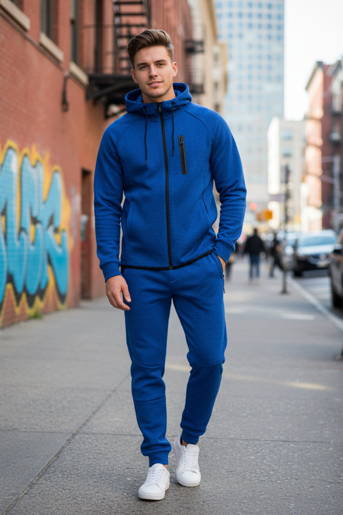 Man wearing a blue tracksuit taken outside