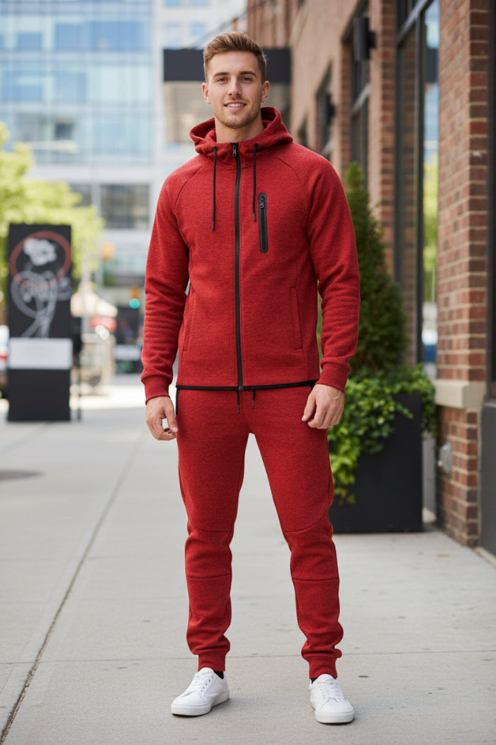 Person wearing a red tracksuit taken outside